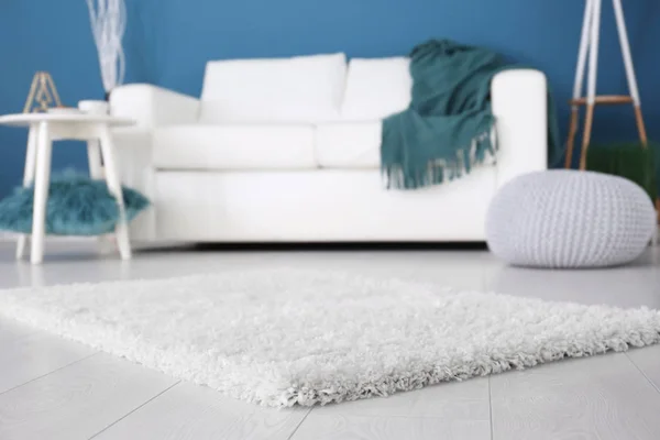 Fluffy carpet on floor in room