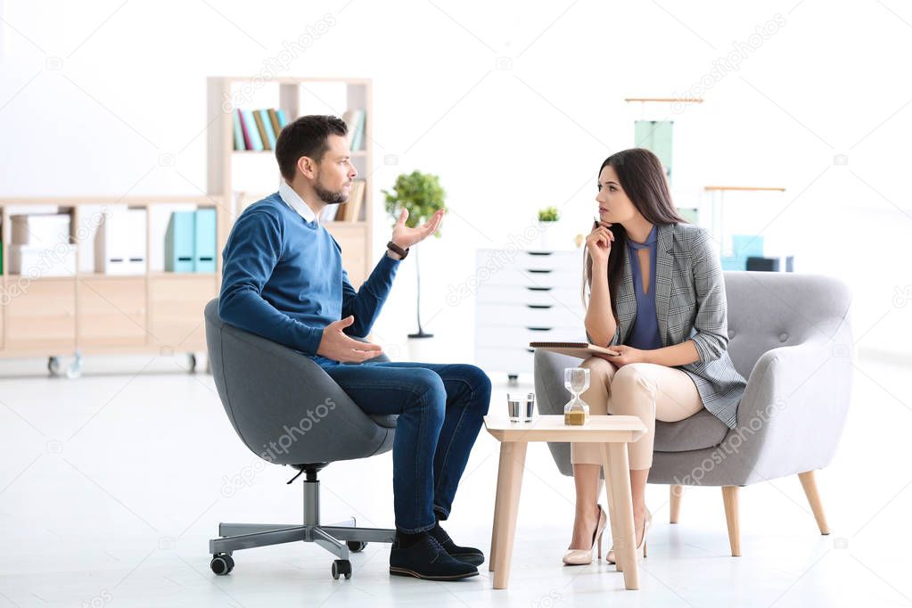 psychologist with patient in office