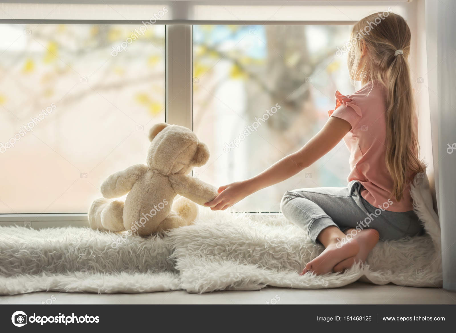 little girl with teddy