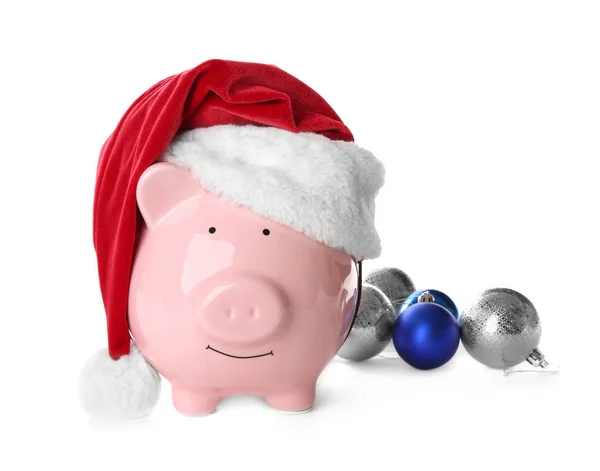 하얀 배경에 산타 모자를 쓴 돼지 은행 — 스톡 사진