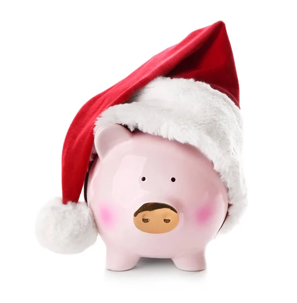 Piggy bank with Santa hat on white background — Stock Photo, Image