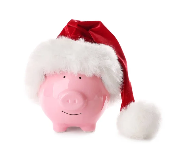 Piggy bank with Santa hat on white background — Stock Photo, Image