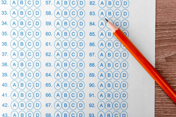 Pencil and test sheet on table, closeup. Preparation for exam — Stock Photo, Image