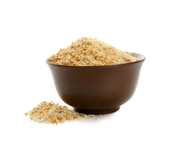 Bowl with granulated dried garlic on white background — Stock Photo, Image