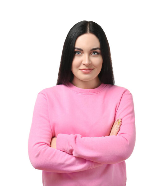 Portrait of young smiling woman on white background