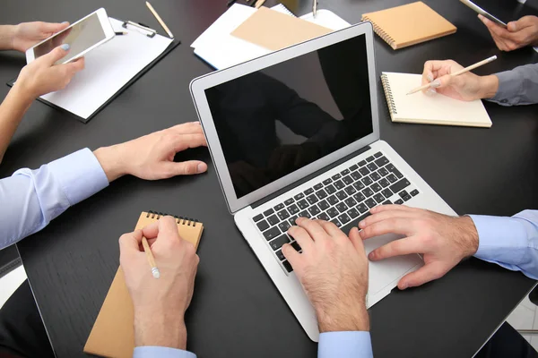 Team of specialists engaged in work on business project — Stock Photo, Image