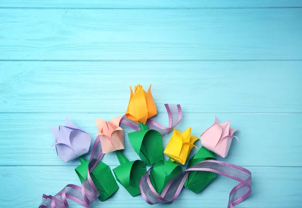 Colorful paper tulips on wooden background — Stock Photo, Image