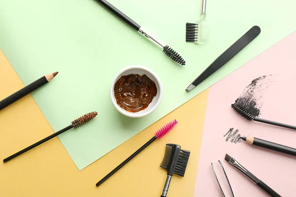 Tools for eyebrow dyeing and correction on color background — Stock Photo, Image