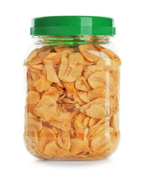 Dried garlic flakes in jar on white background — Stock Photo, Image