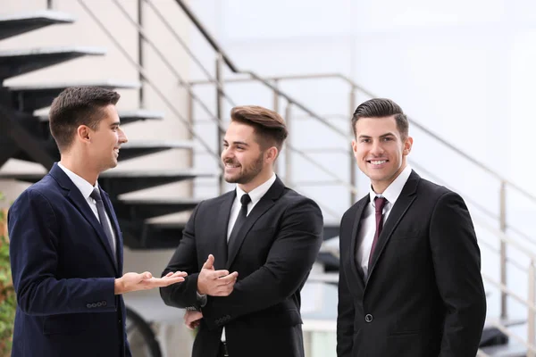 Men in elegant suits at workplace — Stock Photo, Image