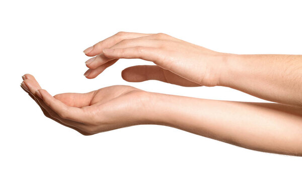 Hands of young woman with healthy skin softened by cream with moisturizing effect, on white background