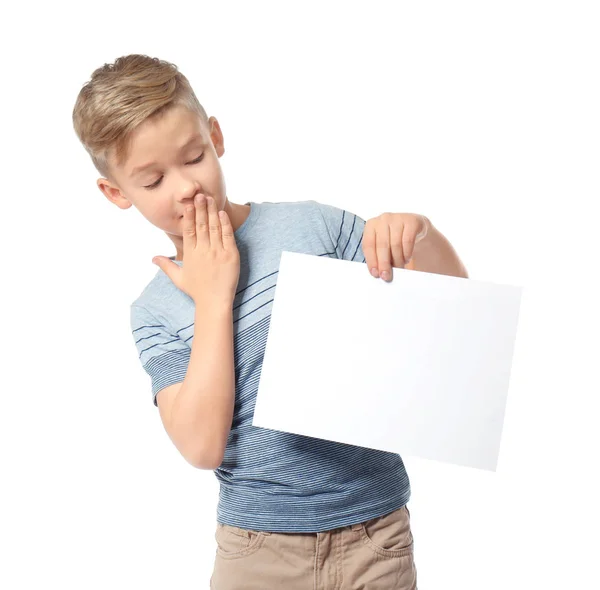 Surprised boy with blank sheet of paper for advertising on white background — Stock Photo, Image