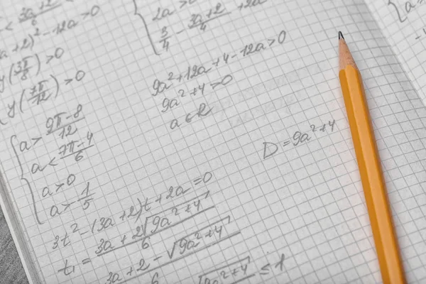 Exercise book with math homework, closeup — Stock Photo, Image