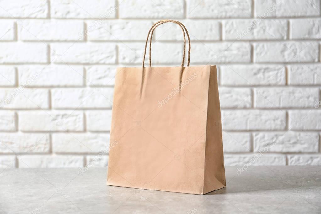 Download Paper Bag Table Mockup Design — Stock Photo © belchonock ...