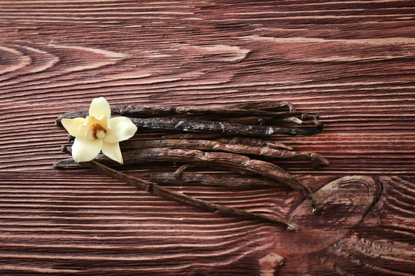 Vanilla Sticks Flower Wooden Background — Stock Photo, Image