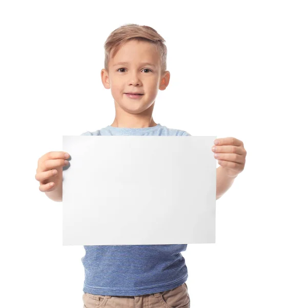 Cute boy with blank sheet of paper for advertising on white background — Stock Photo, Image