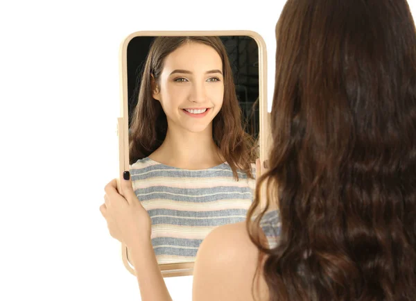 Joven Chica Bonita Mirando Espejo Sobre Fondo Blanco —  Fotos de Stock