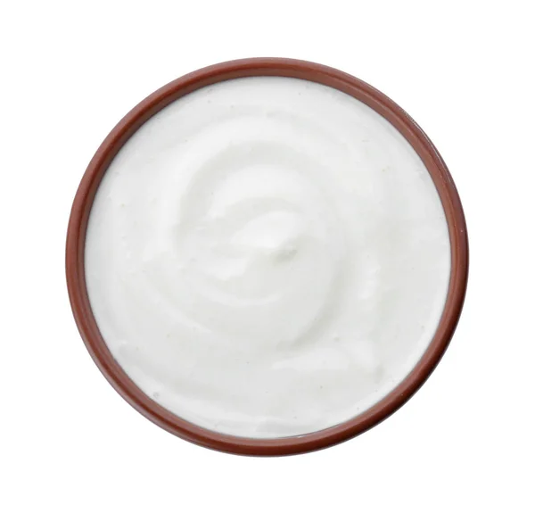 Iogurte saboroso em prato no fundo branco — Fotografia de Stock