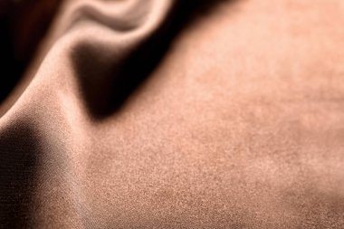 Kumaş dokulu arka plan olarak kıvrımlar ve