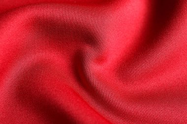 Kumaş dokulu arka plan olarak kıvrımlar ve