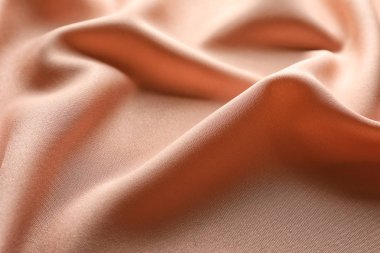 Kumaş dokulu arka plan olarak kıvrımlar ve