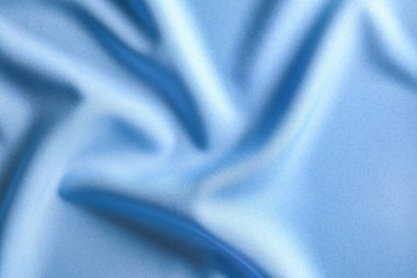 Kumaş dokulu arka plan olarak kıvrımlar ve