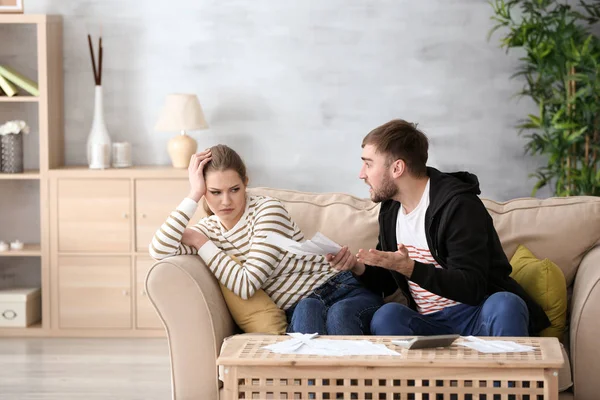 Couple arguing about money at home. Problems in relationship — Stock Photo, Image