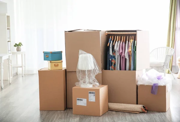 Wardrobe boxes with clothes — Stock Photo, Image