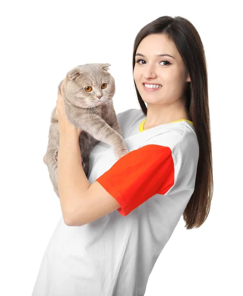Young woman with cute pet cat on white background — Stock Photo, Image