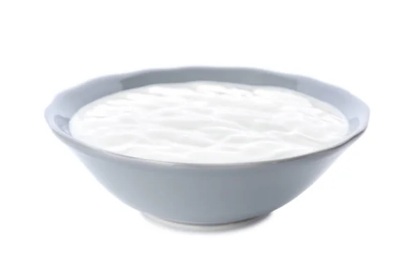 Sabroso yogur en plato sobre fondo blanco —  Fotos de Stock