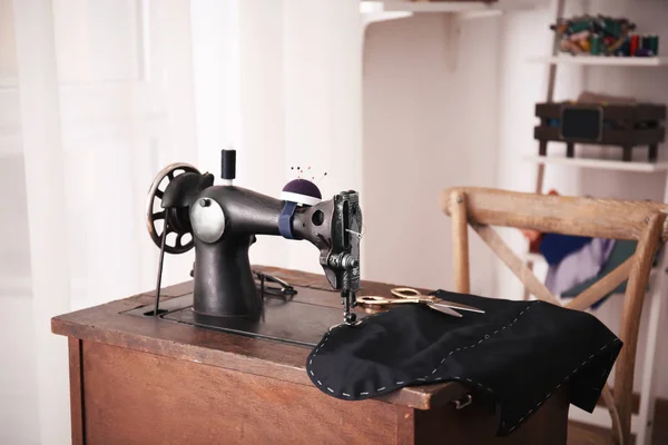 Tailor desk with old sewing machine | Stock Images Page | Everypixel