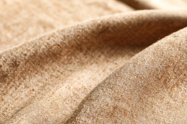 Kumaş dokulu arka plan olarak kıvrımlar ve