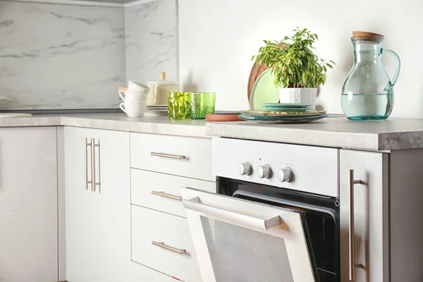 Modern electrical white oven in kitchen — Stock Photo, Image