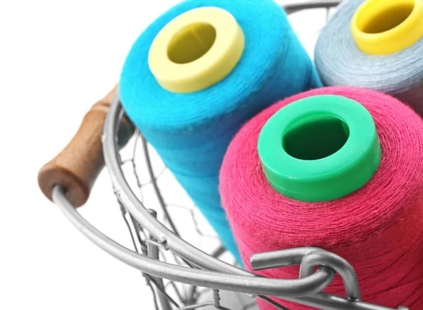 Metal basket with colorful sewing threads — Stock Photo, Image