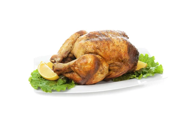 Plate with delicious whole roasted chicken on white background — Stock Photo, Image