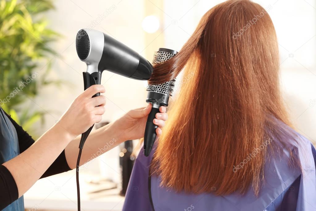 hairdresser working with client 