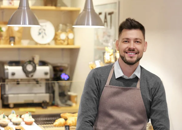 Business owner in his bakery — Stock Photo, Image