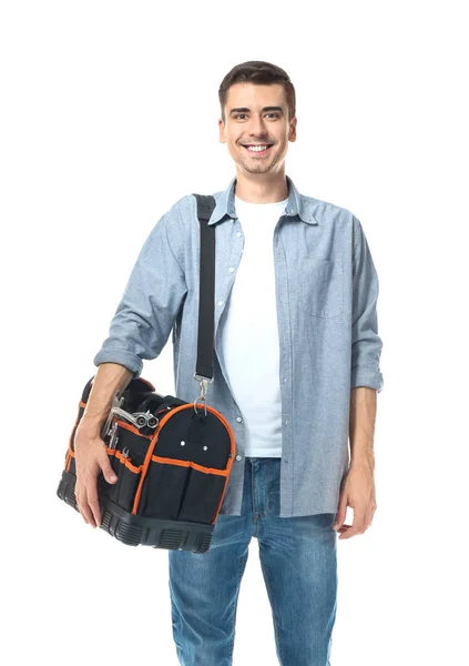 Junger Klempner mit Werkzeugtasche auf weißem Hintergrund — Stockfoto