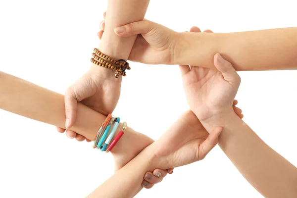 Pessoas de mãos dadas como símbolo de unidade no fundo branco — Fotografia de Stock