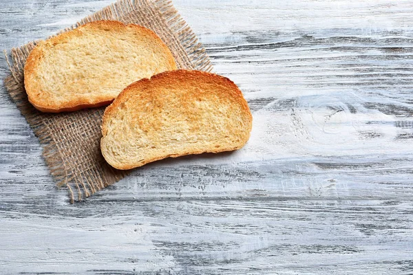 Roti Panggang Dengan Latar Belakang Kayu — Stok Foto