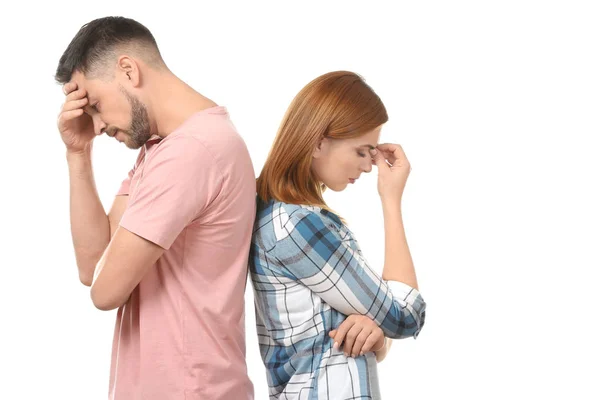 Depressed couple after quarrel on white background — Stock Photo, Image