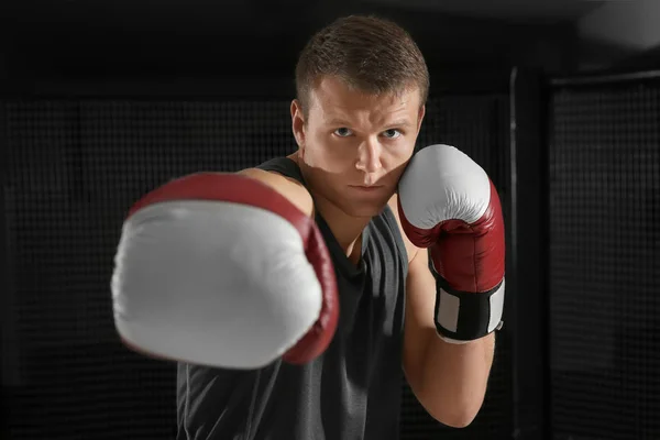 Portrait of young handsome boxer in gym — Stock Photo, Image