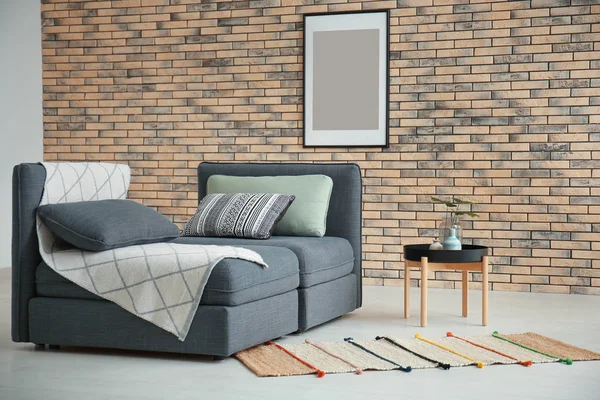 Beautiful trendy room interior with comfortable sofa — Stock Photo, Image