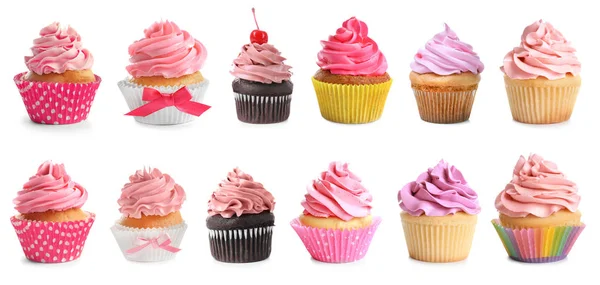 Set de sabrosos cupcakes sobre fondo blanco — Foto de Stock