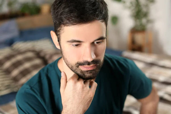 Young bearded man in casual clothes indoors — Stock Photo, Image