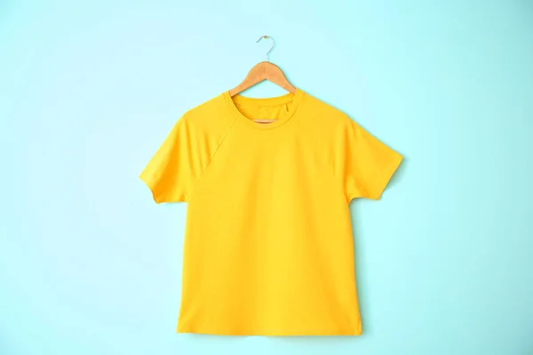Color t-shirt on light background. Mockup for design — Stock Photo, Image