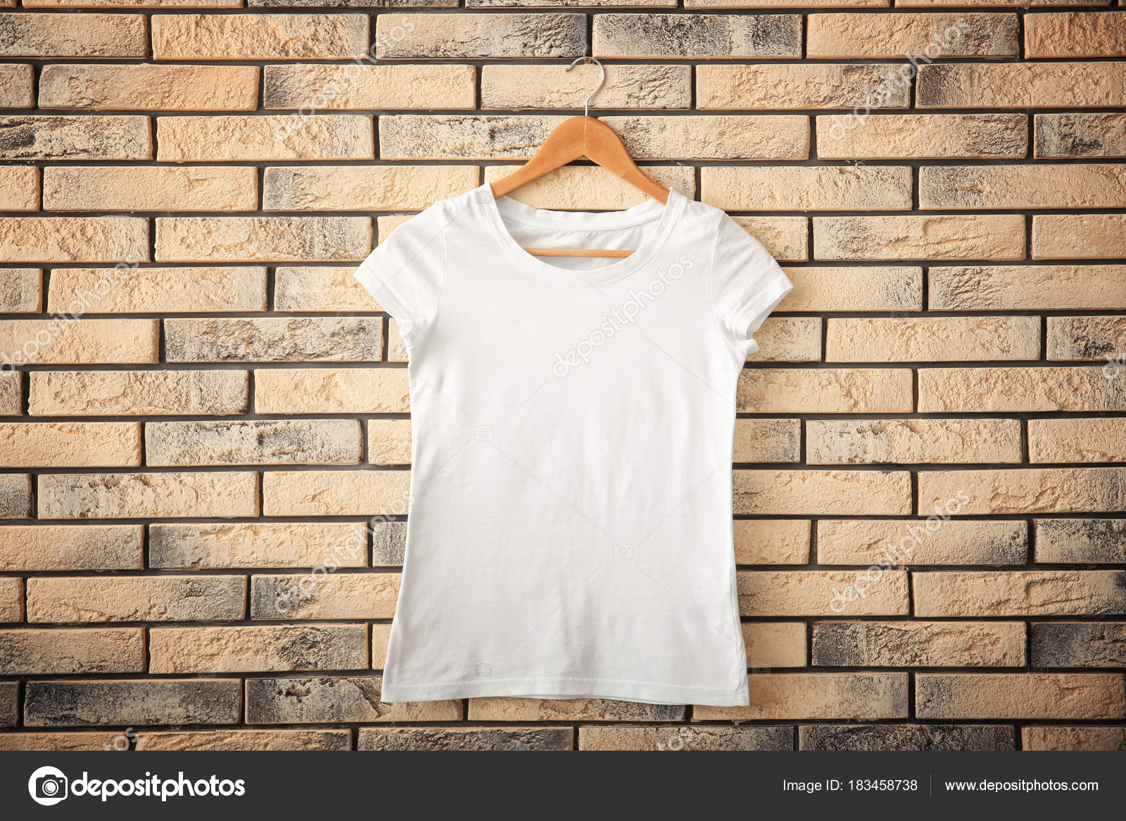 Download White t-shirt on brick wall background. Mockup for design ...