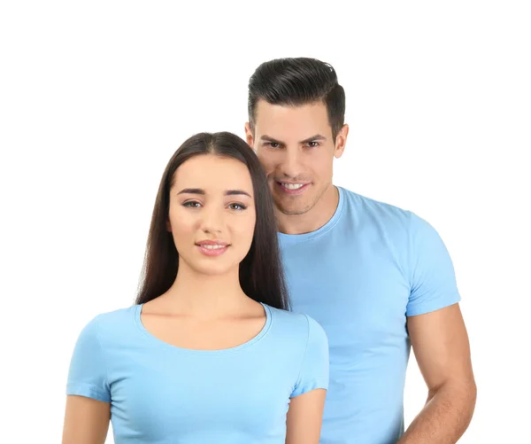 Genç adam ve beyaz arka plan üzerinde şık t-shirt kadında. Mockup tasarım için — Stok fotoğraf