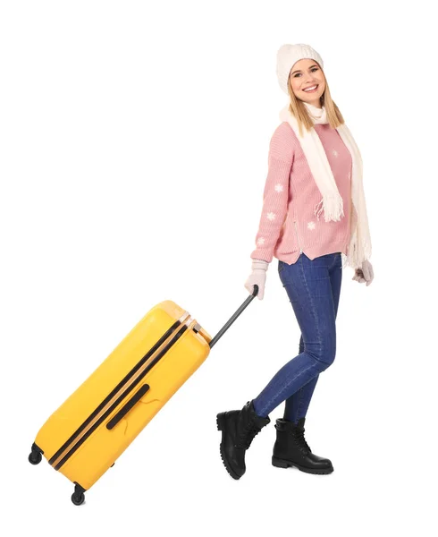 Young woman with luggage on white background. Ready for winter vacation — Stock Photo, Image