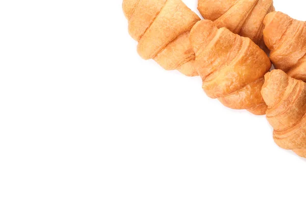 Smaklig croissanter på vit bakgrund — Stockfoto